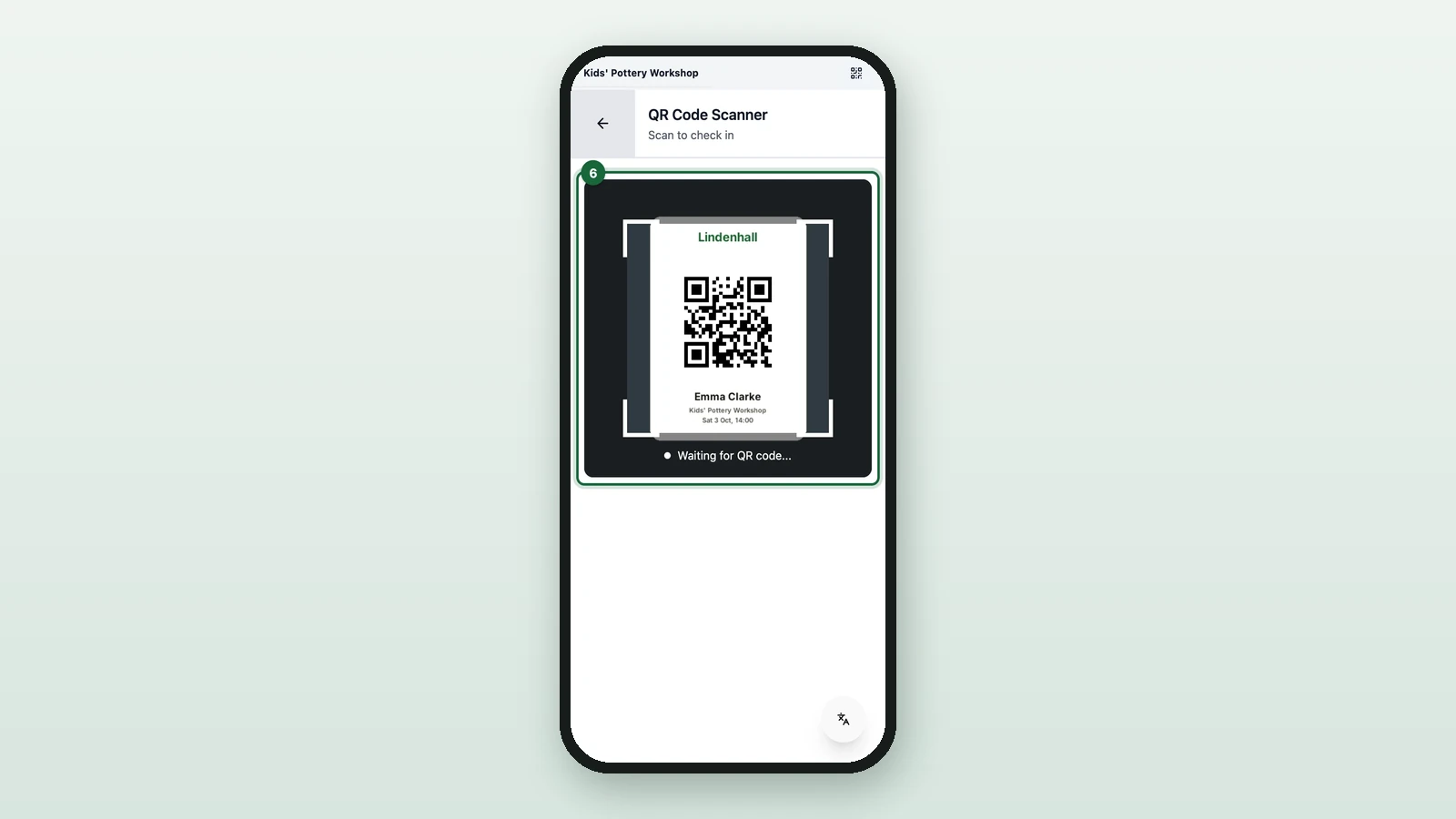 QR Code Scanner with a guest's ticket in the camera, highlighted on a phone