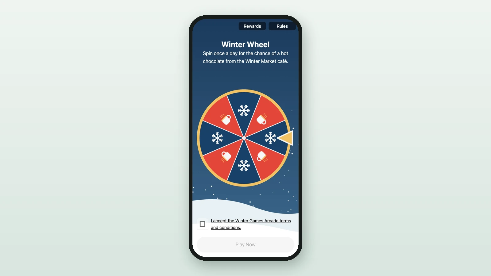 The Winter Wheel on a phone: title, subtitle, the wheel with its pointer, the terms checkbox and Play Now