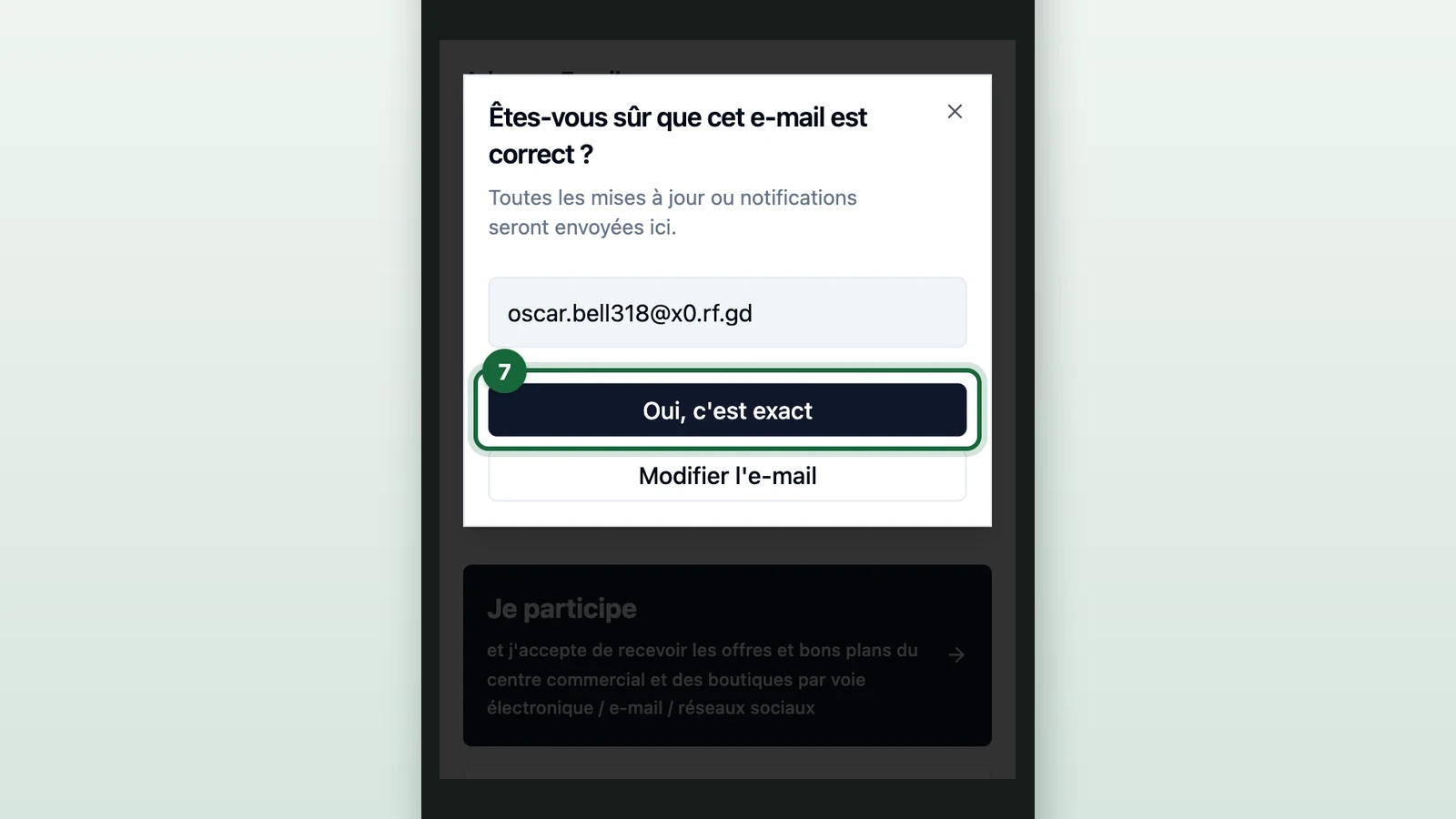 Email check window with Oui, c'est exact highlighted on a phone