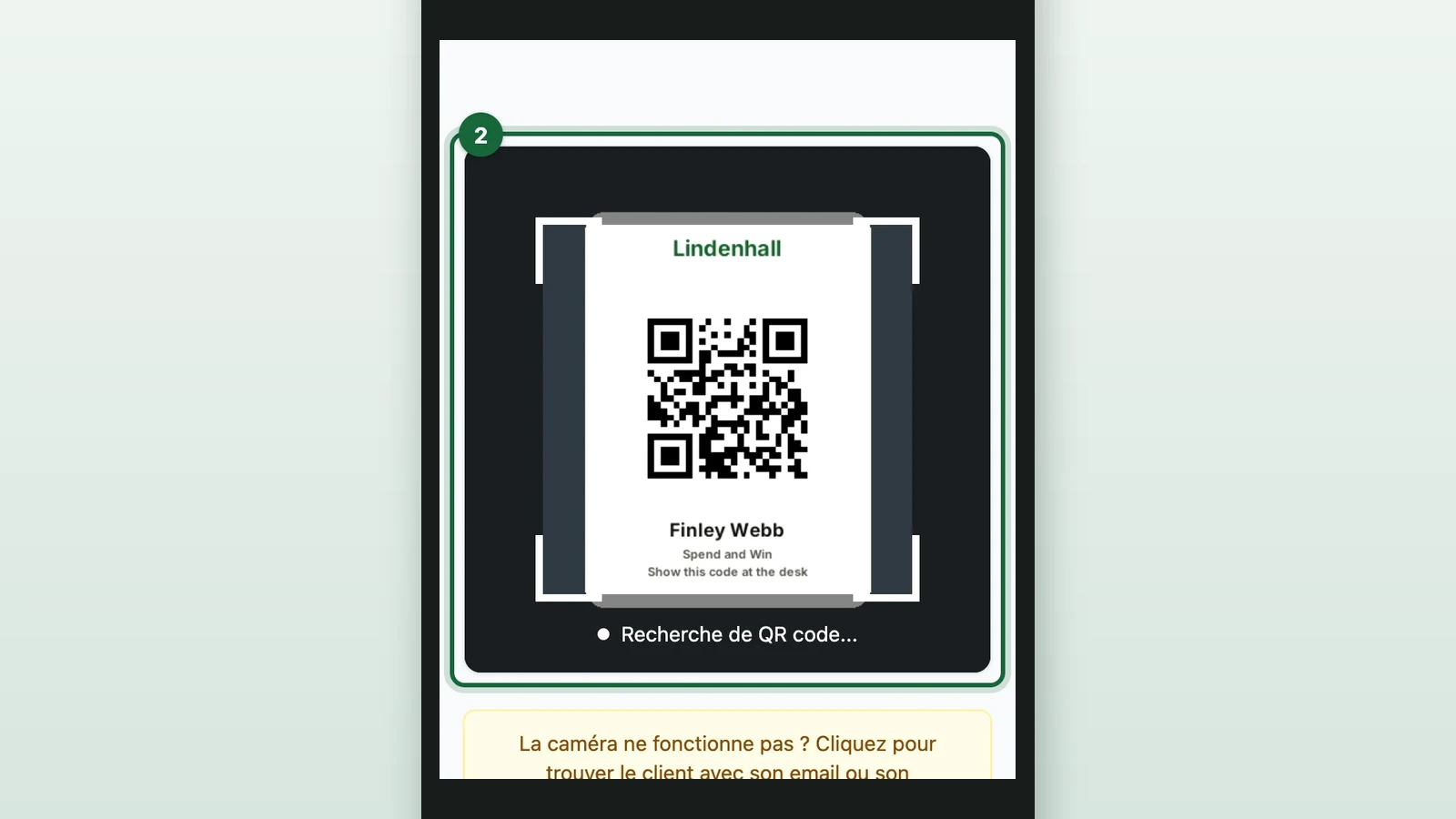 QR code scanner showing Finley Webb's code, with the camera view highlighted on a phone