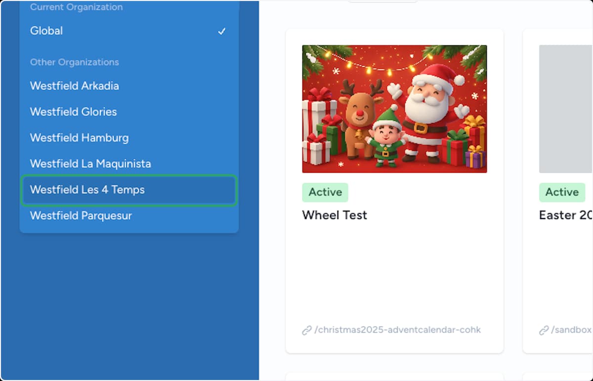 Organisation switcher open in the sidebar with a destination organisation highlighted in the list
