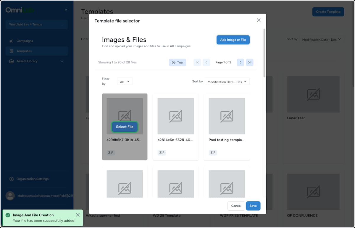 Grille Images and Files avec un message de réussite et l'action Select File mise en évidence sur la carte du nouveau ZIP
