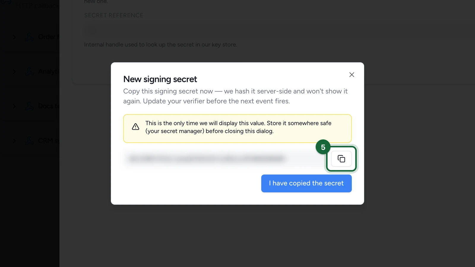 New signing secret window, the value blurred here, with the copy button highlighted